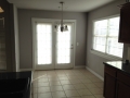 The dining area door opens up to the patio